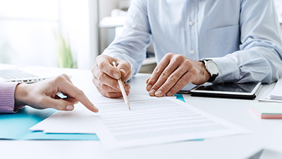 ATM maintenance contract being reviewed and signed